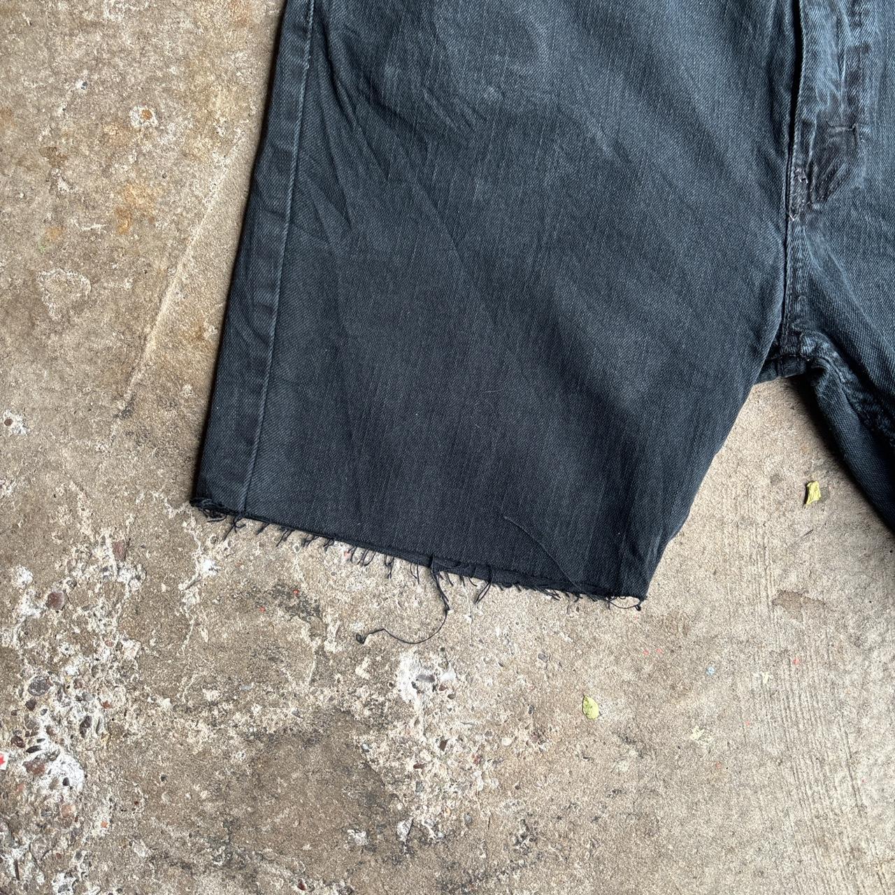 Dark Denim Levi’s 511 Ripped Jean Shorts