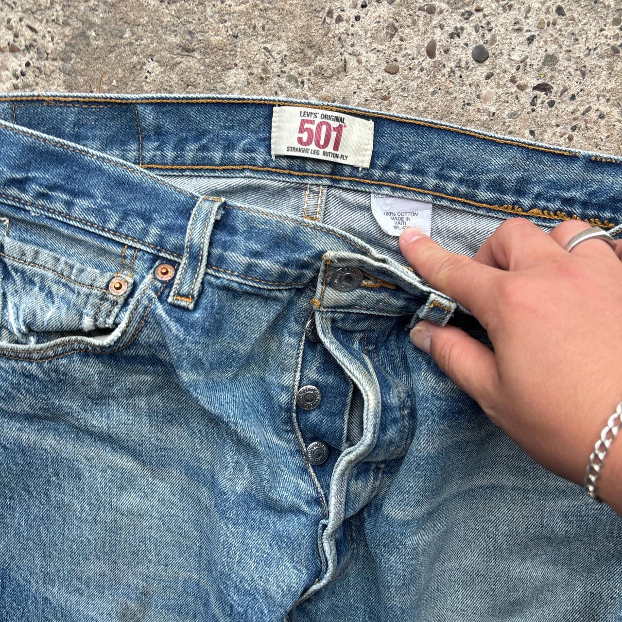 Blue Levi’s 501 distressed jeans - W34