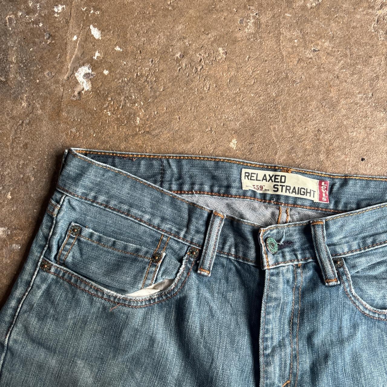 Textured Blue Denim Levi’s 559 Jean Shorts
