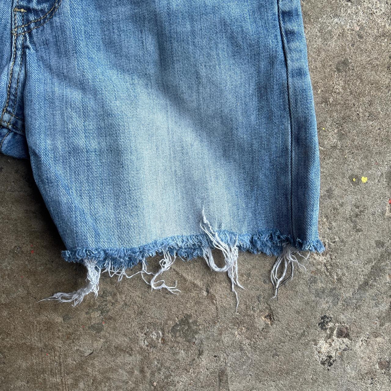 Light Blue Denim Levi’s Ripped Jean Shorts