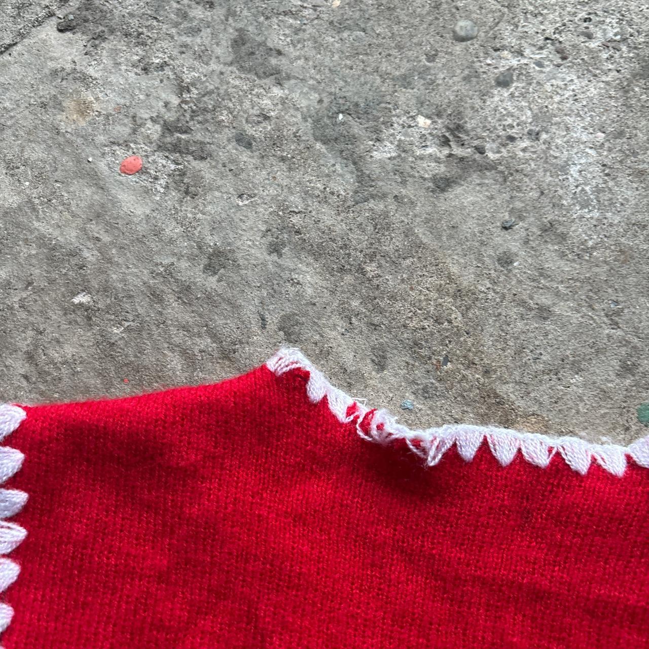 Red and white hand knitted vest