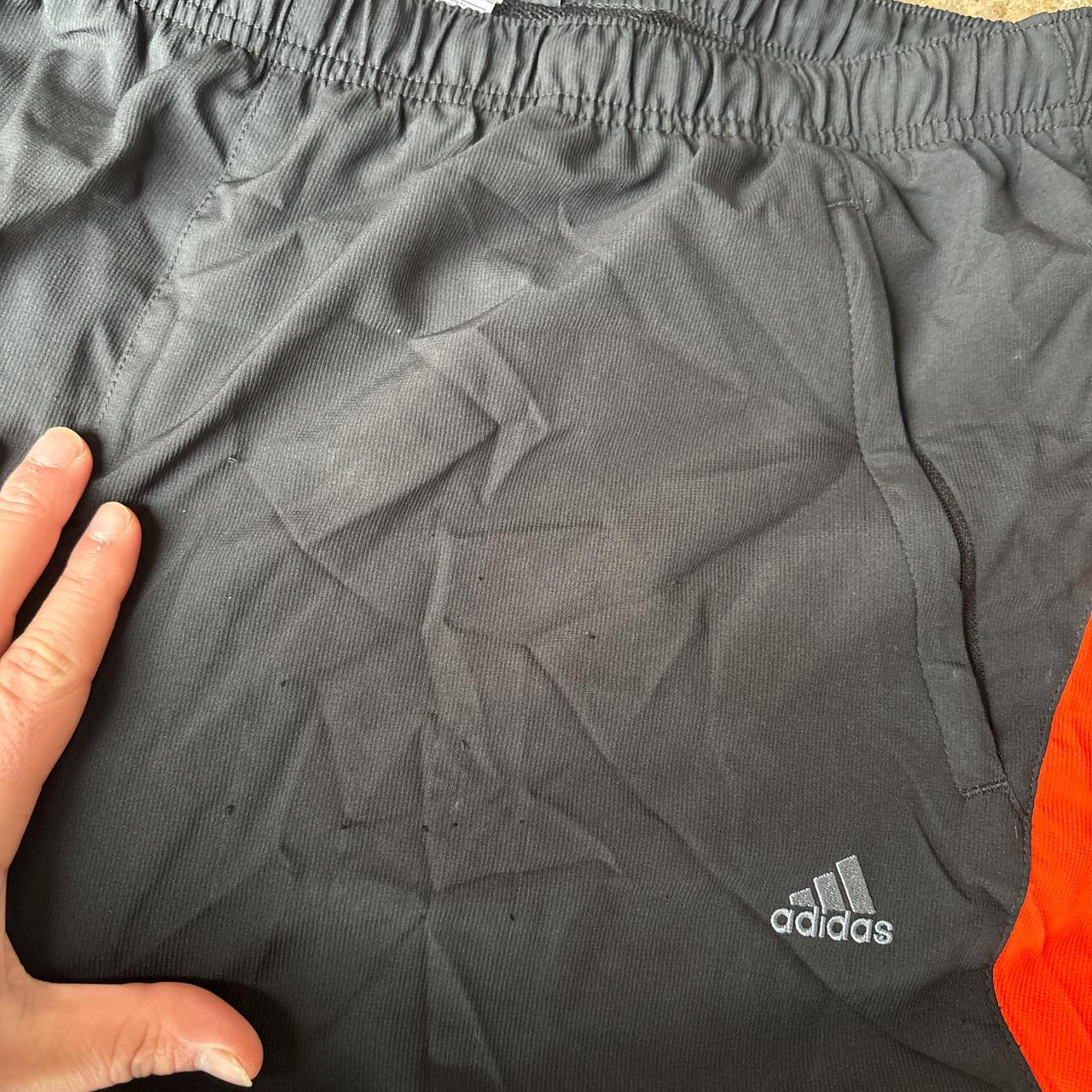 00s Black and orange Adidas track pants