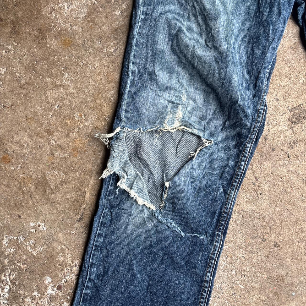 Blue Denim Distressed Levi’s Jeans