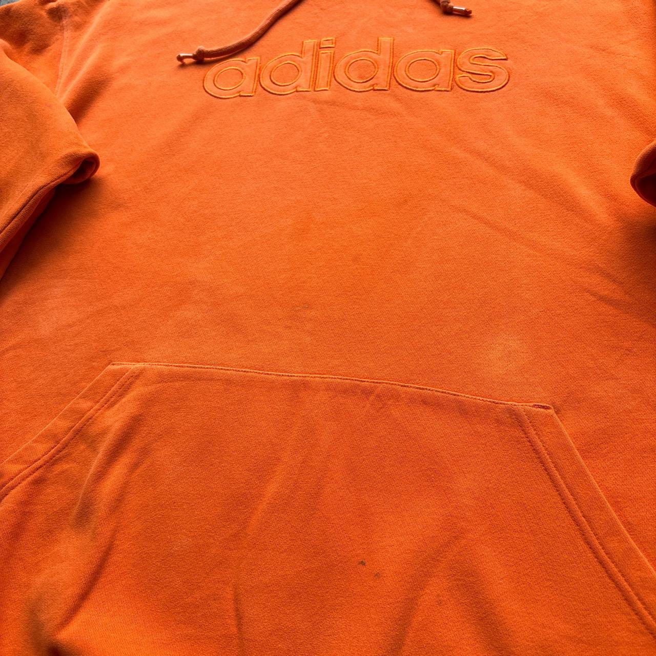 Orange Adidas hoody with embroidered logos