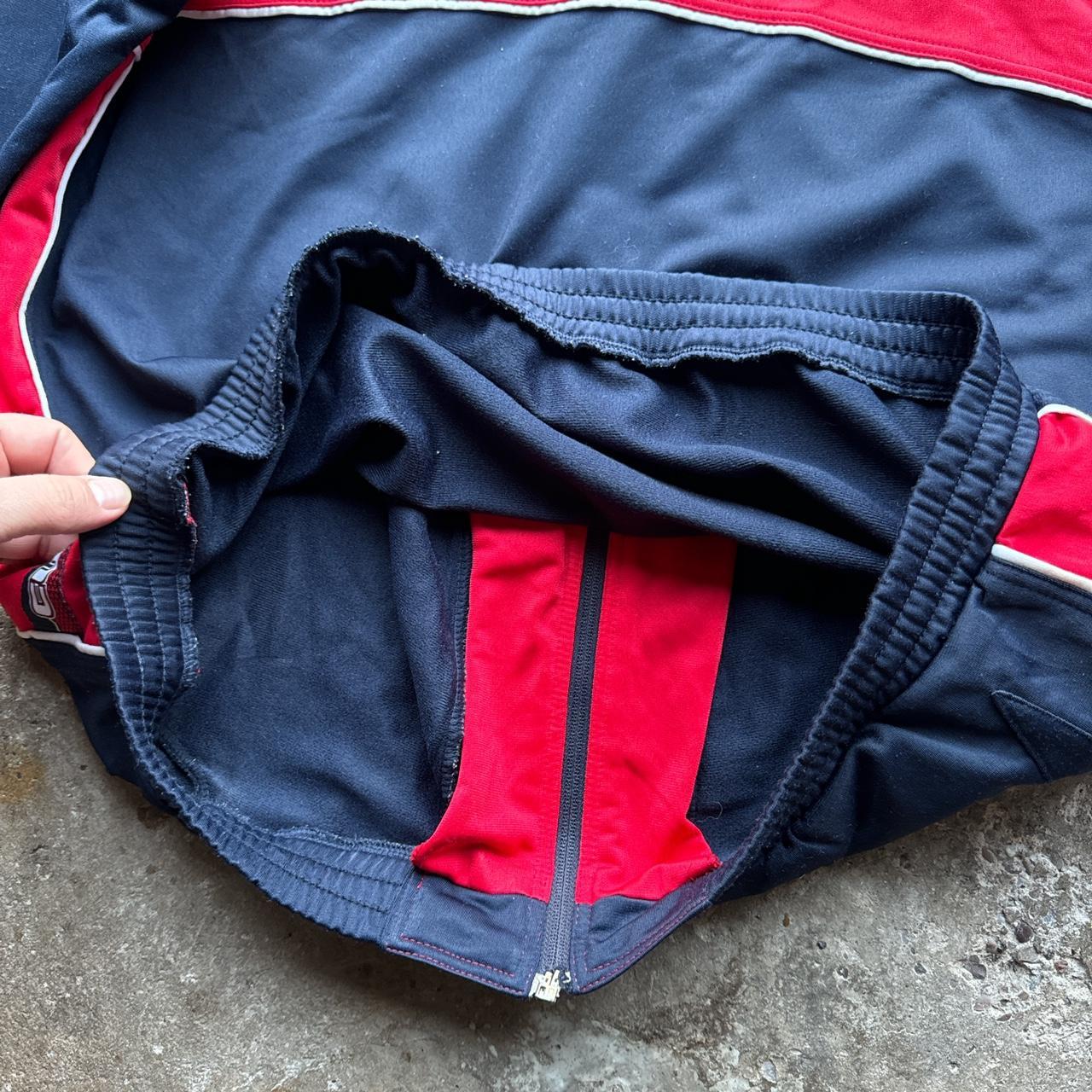 Navy, red and white vintage Puma sportswear jacket
