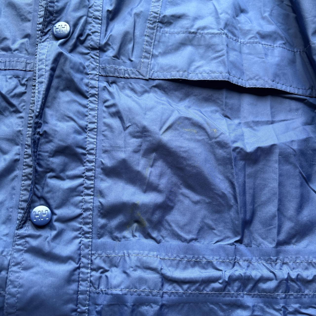 Blue vintage Helly Hansen lightweight windbreaker jacket