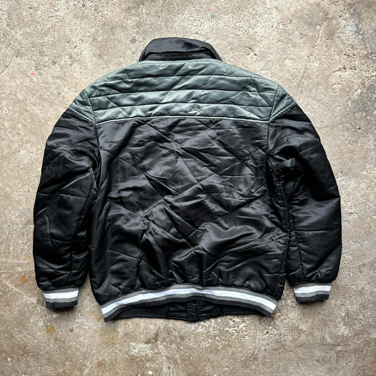 Black and grey Fila jacket