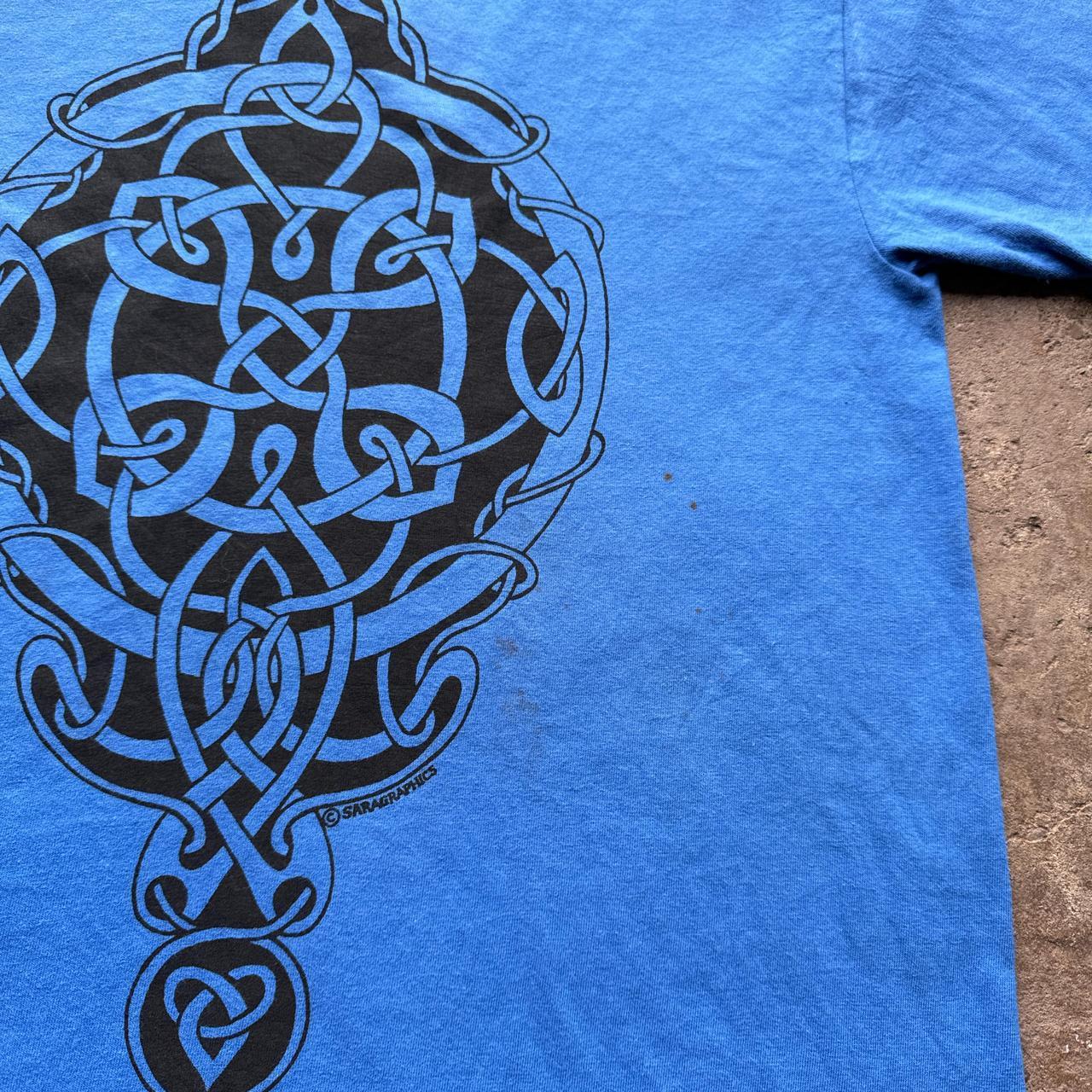 Blue graphic tee with Celtic print