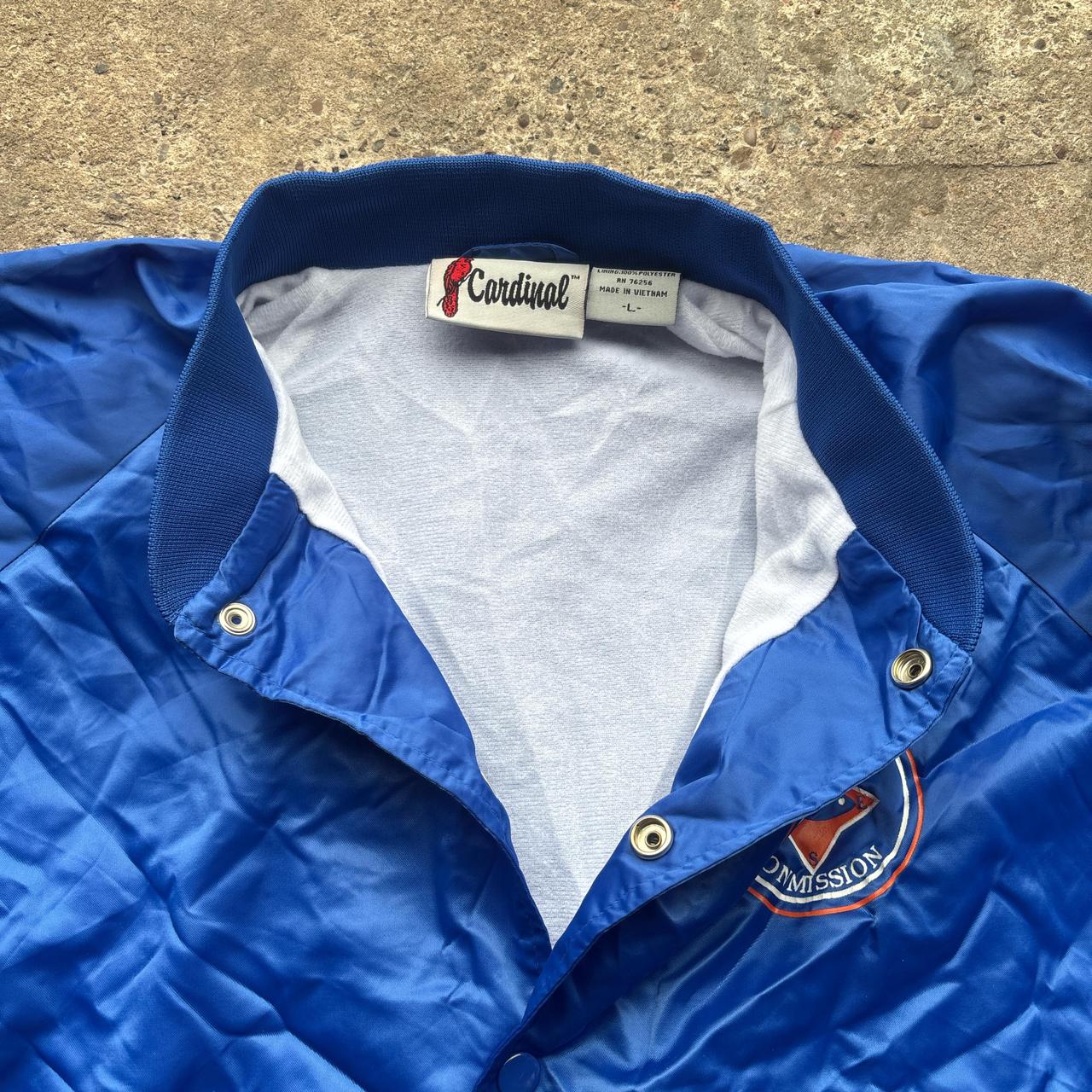 Blue Cardinal bomber jacket with ‘Campers on Mission’ logo