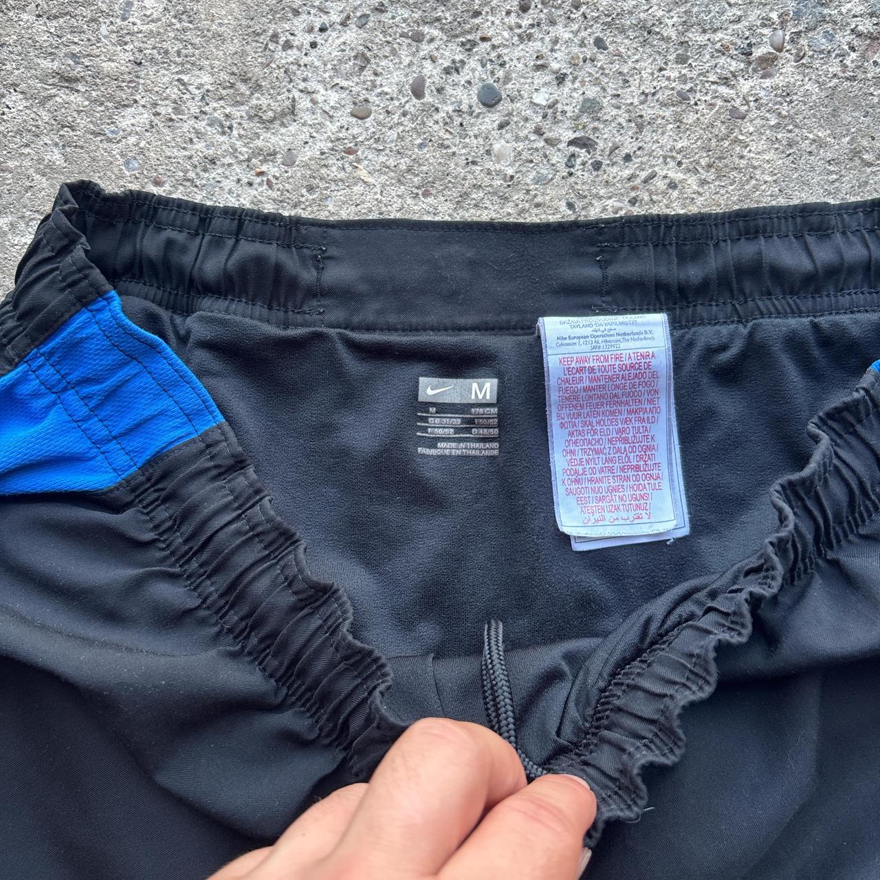 Black and blue Nike Football shorts - M