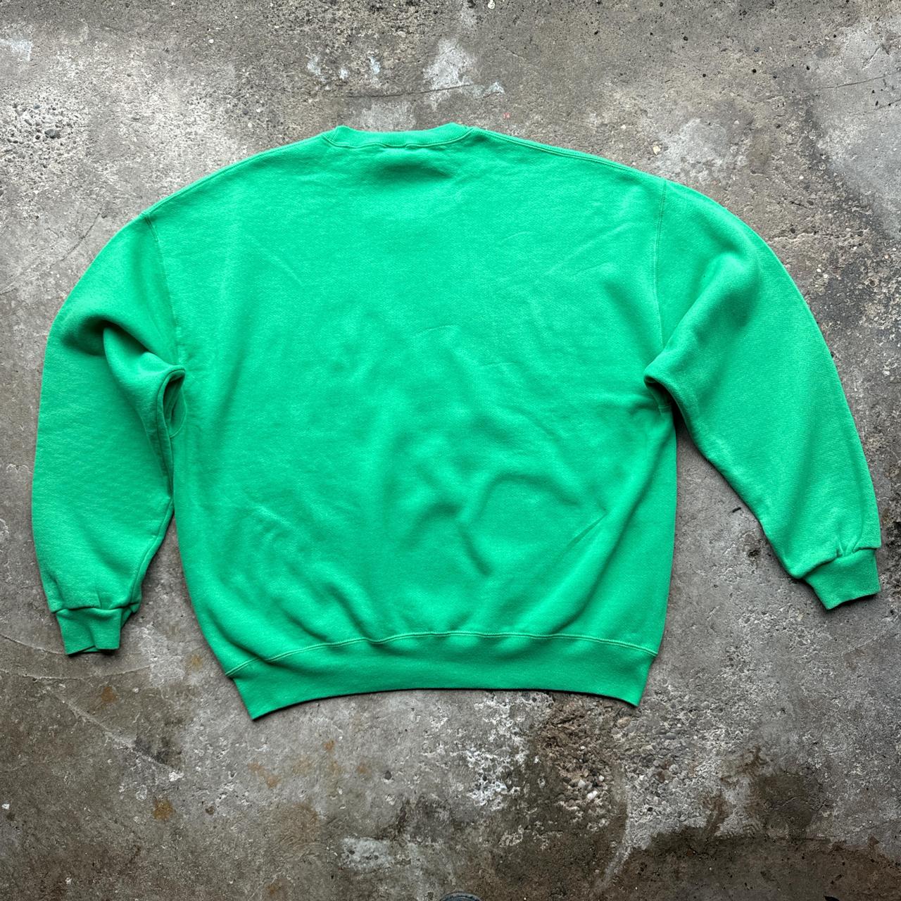 Green graphic sweatshirt with ‘St