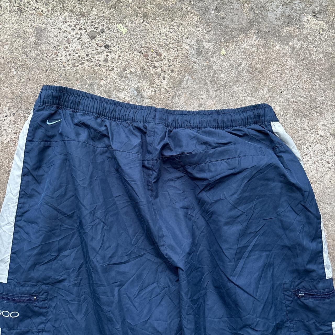 00s Navy and grey Nike track pants with embroidered logo