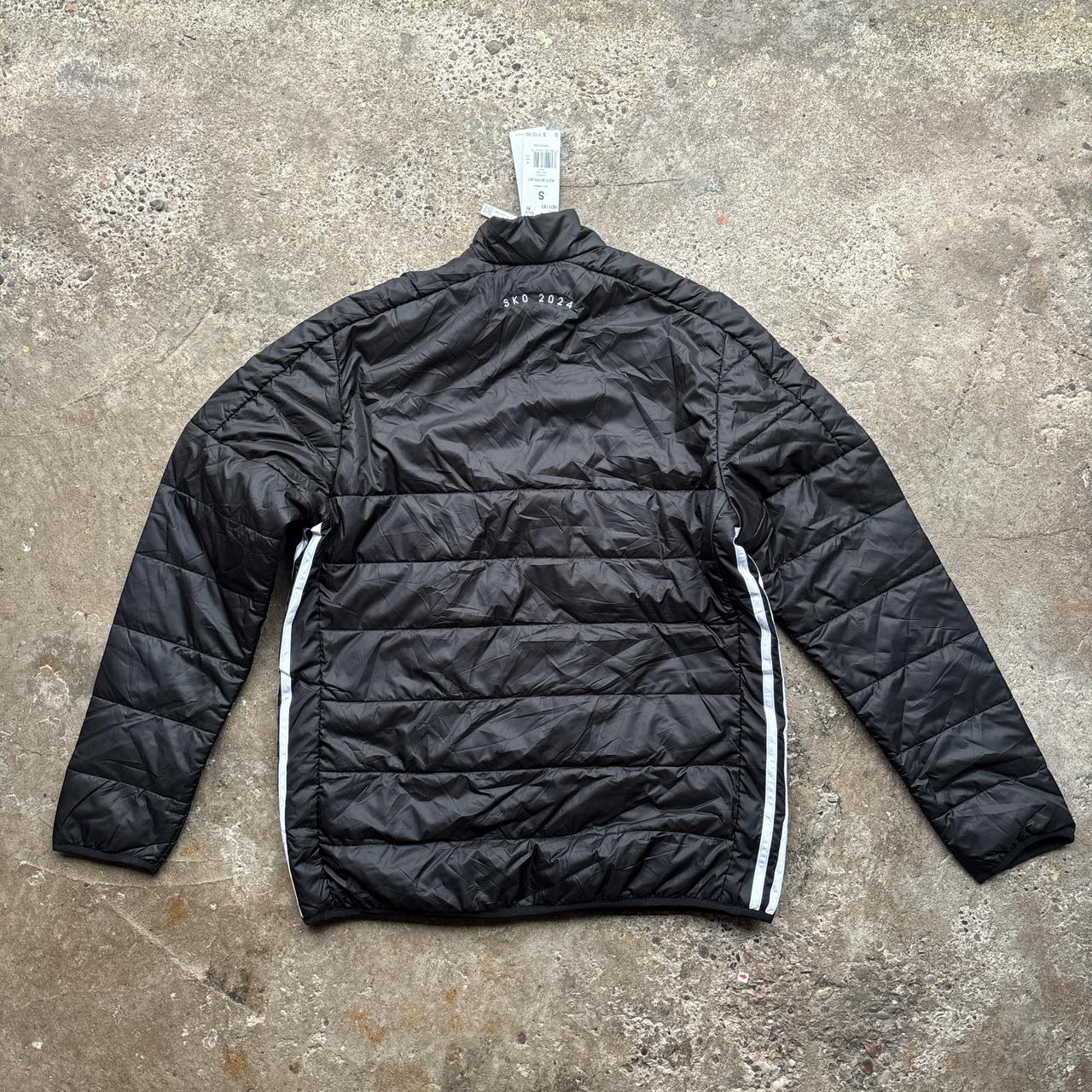 Black Adidas puffer jacket with Mario Kart embroidered logo