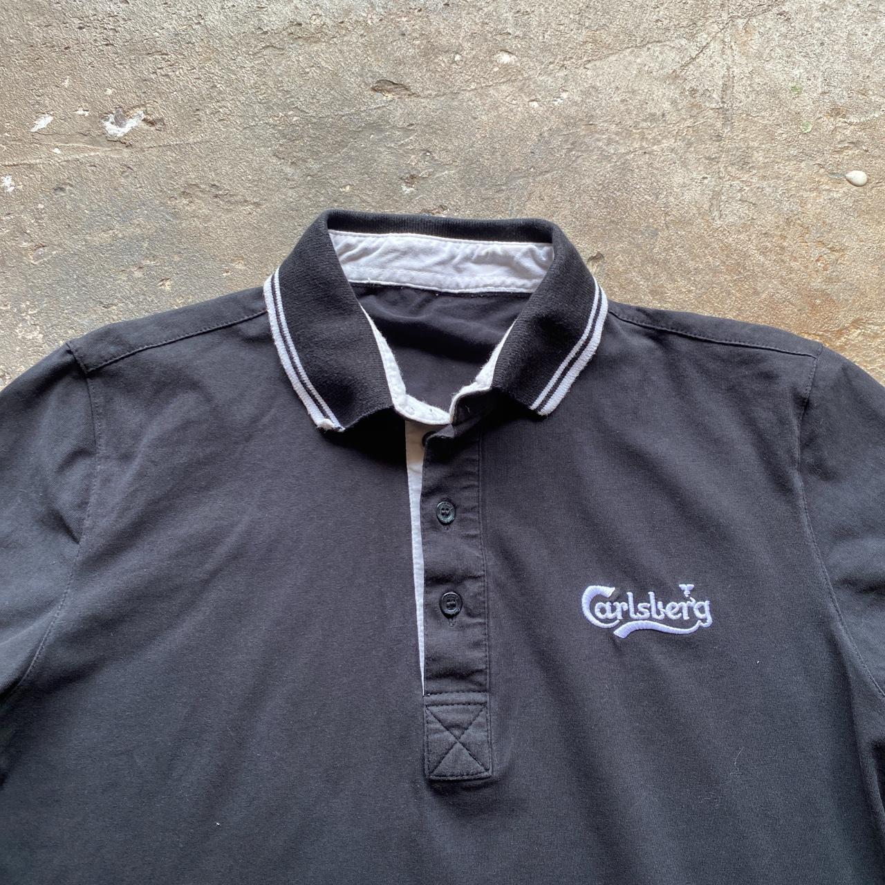 Black Carlsberg polo shirt with white tips