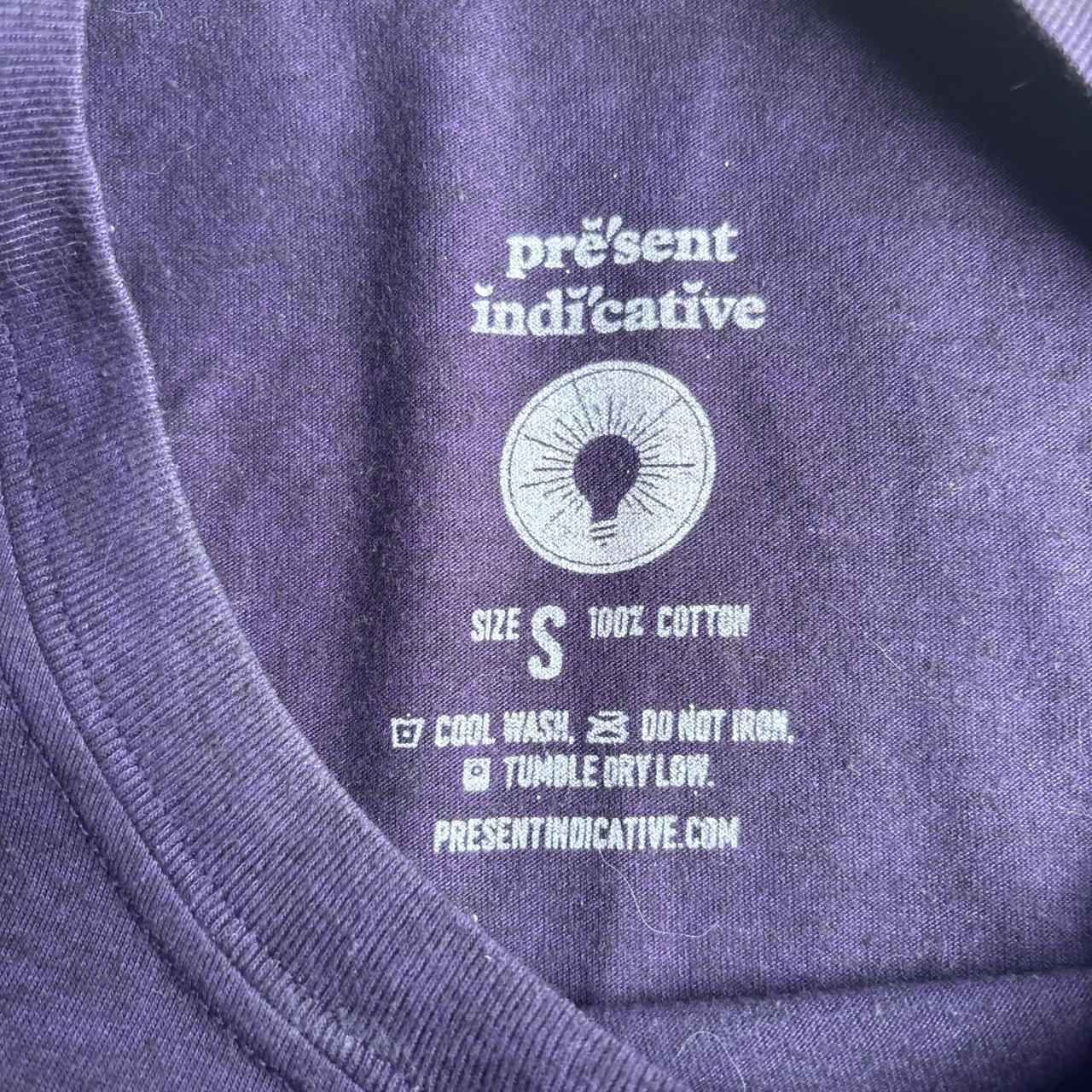 Vintage Purple T-Shirt Featuring Text Print