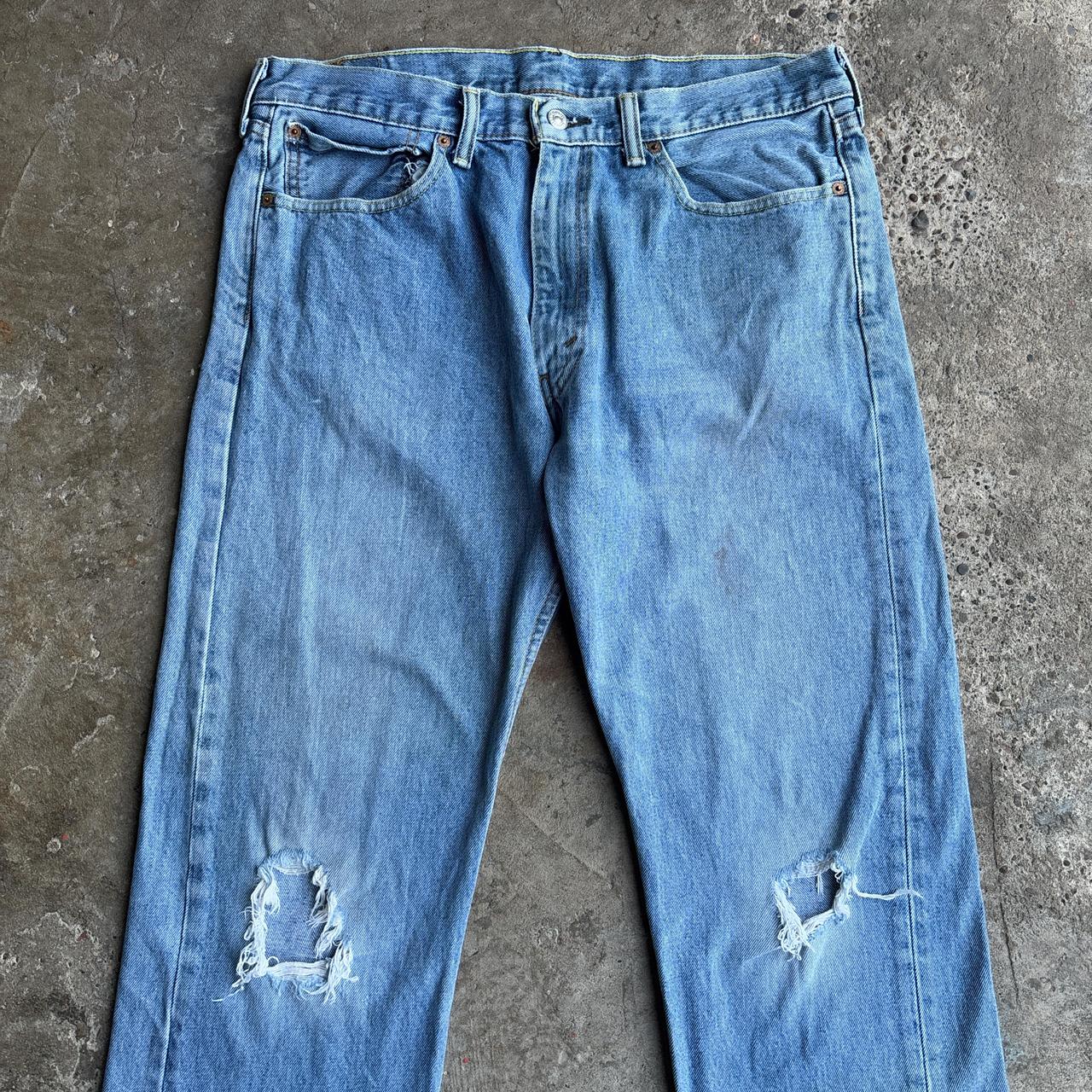 Levi's 505 distressed blue denim jeans