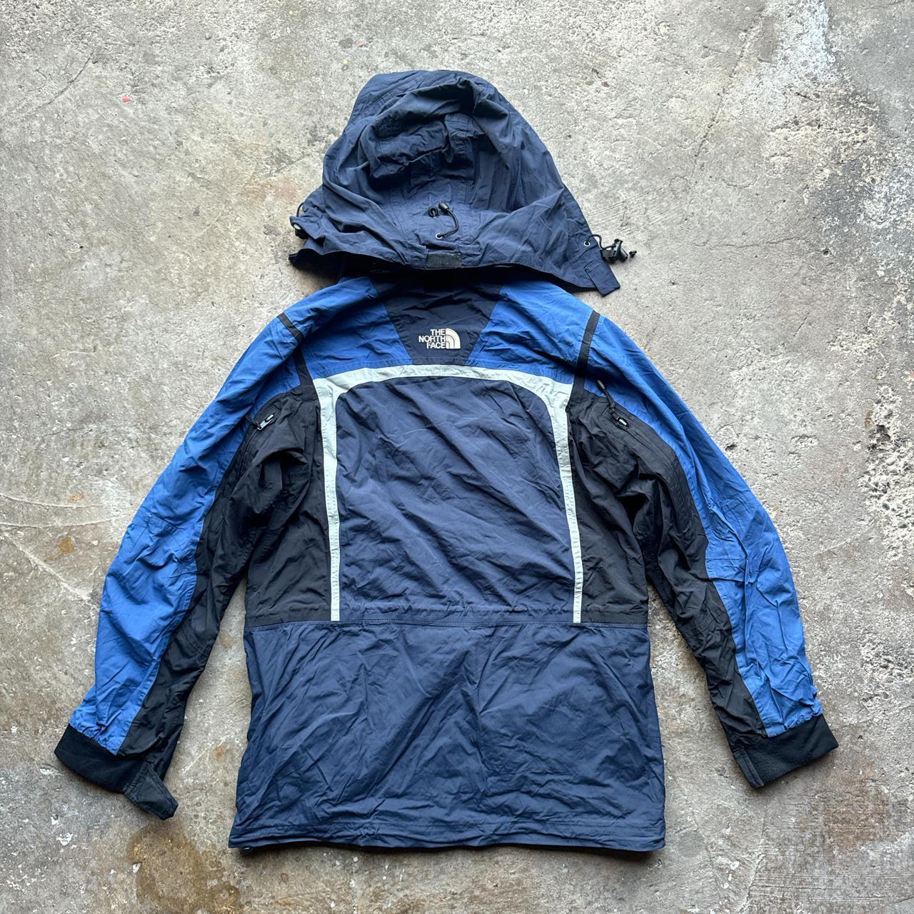 Navy, blue and black The North Face winter jacket