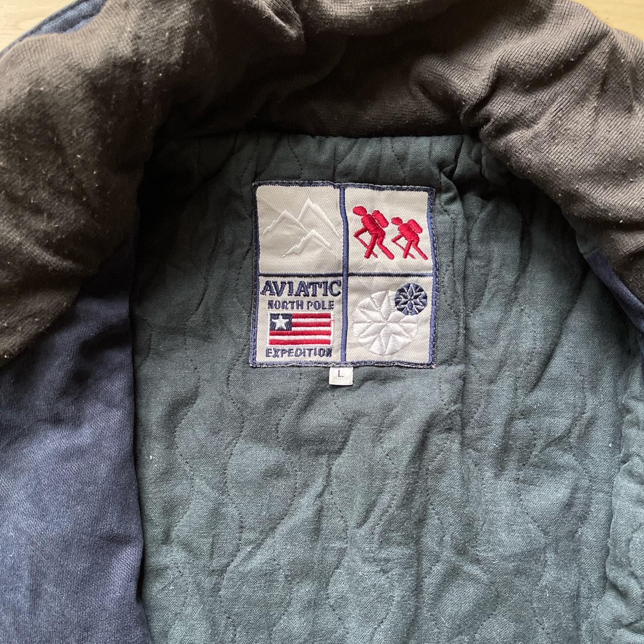 Blue aviatic jacket with soft green lining