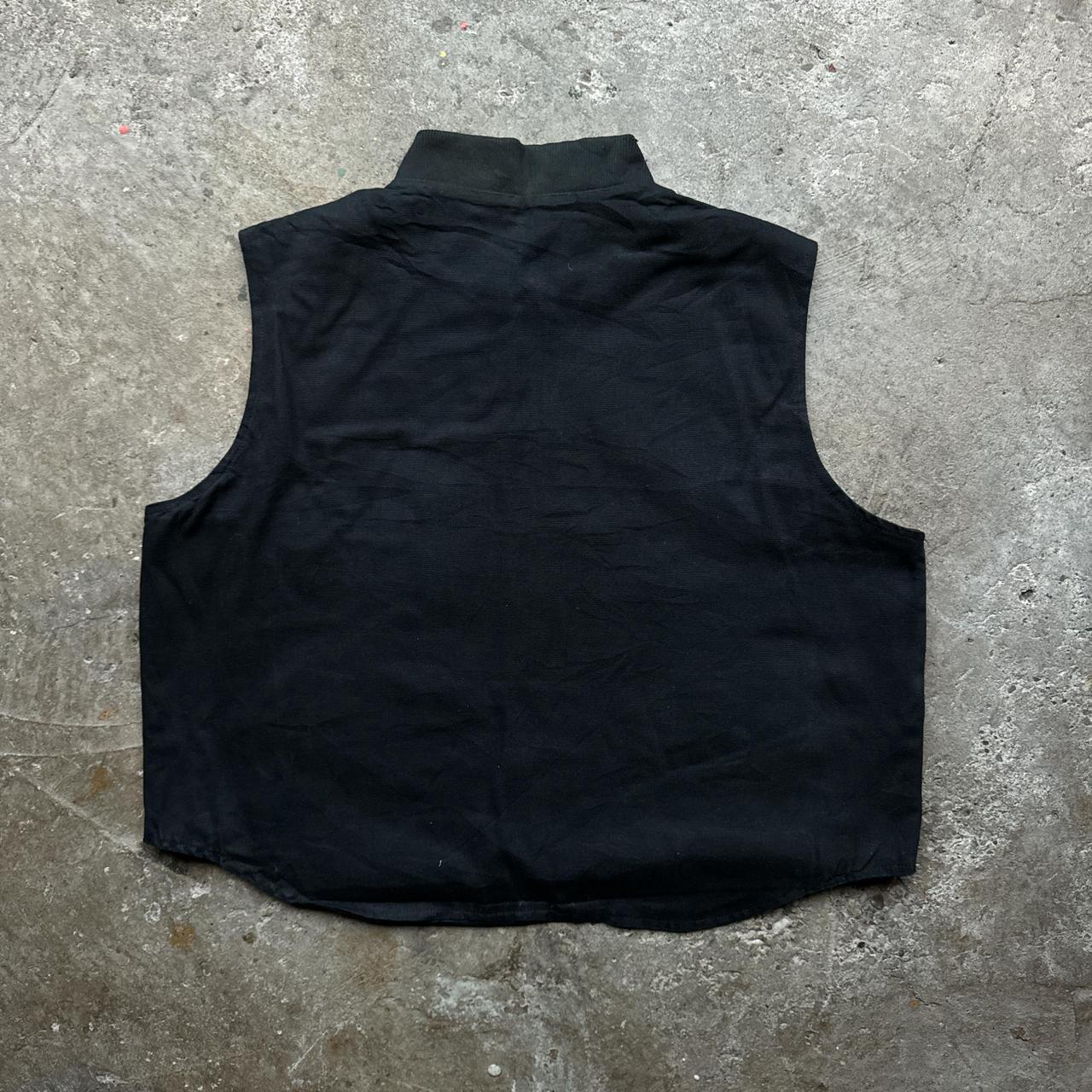 Black workwear body warmer with soft quilted lining and embroidered logo