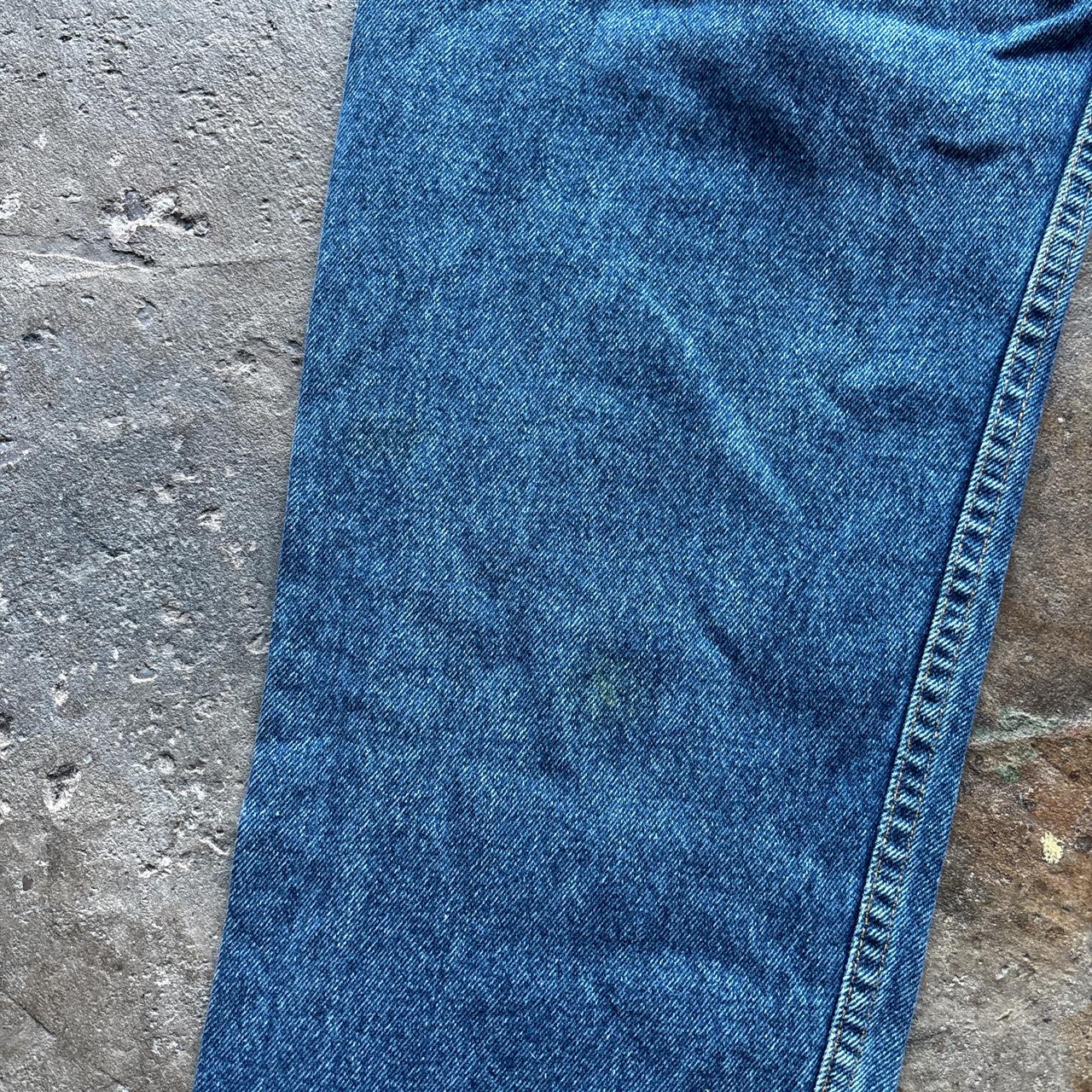 Levis 550 blue denim jeans with orange label