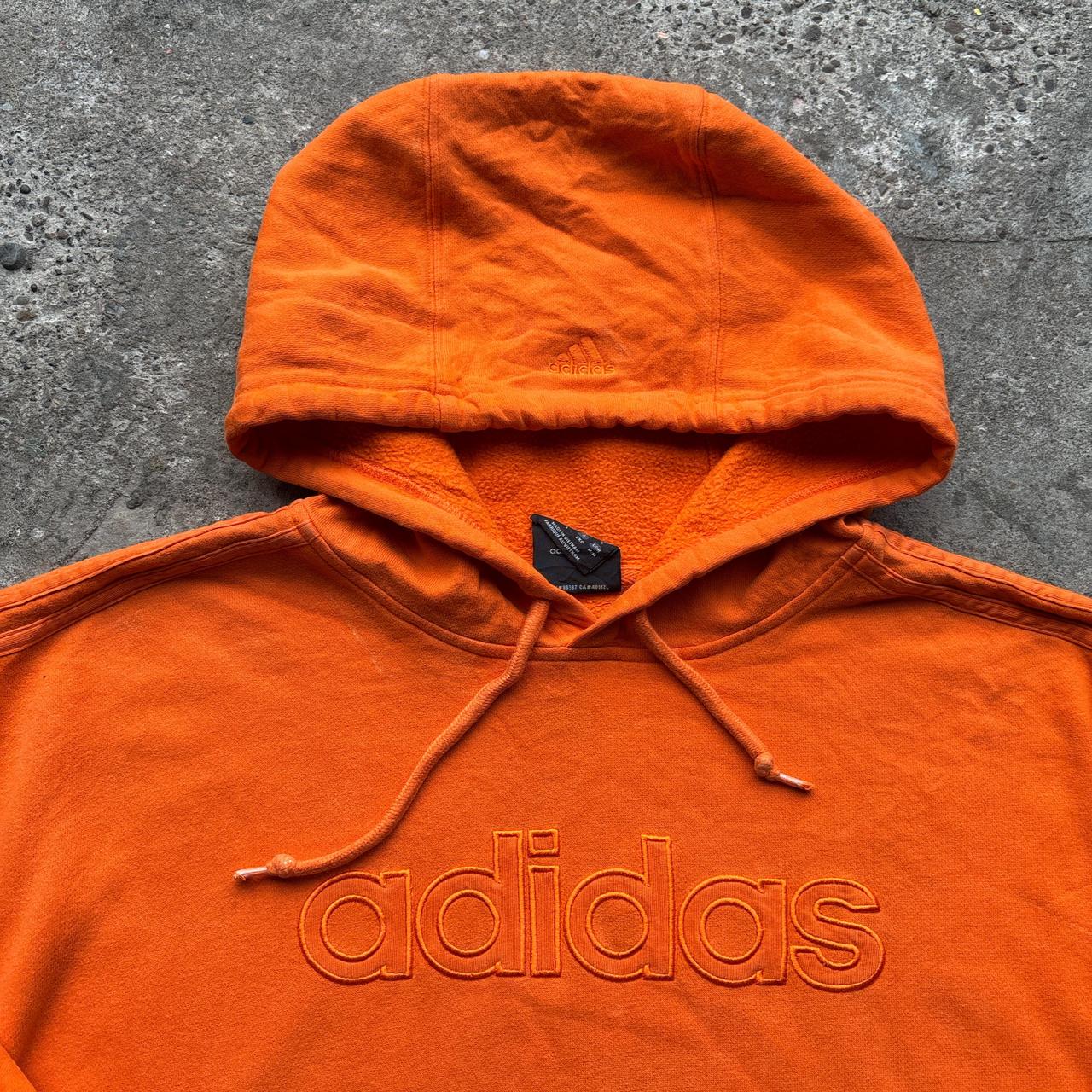 Orange Adidas hoody with embroidered logos