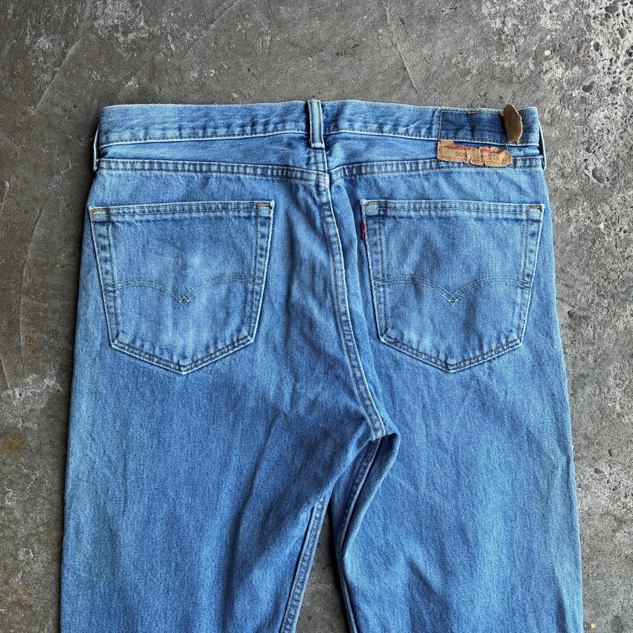 Levi's 505 distressed blue denim jeans