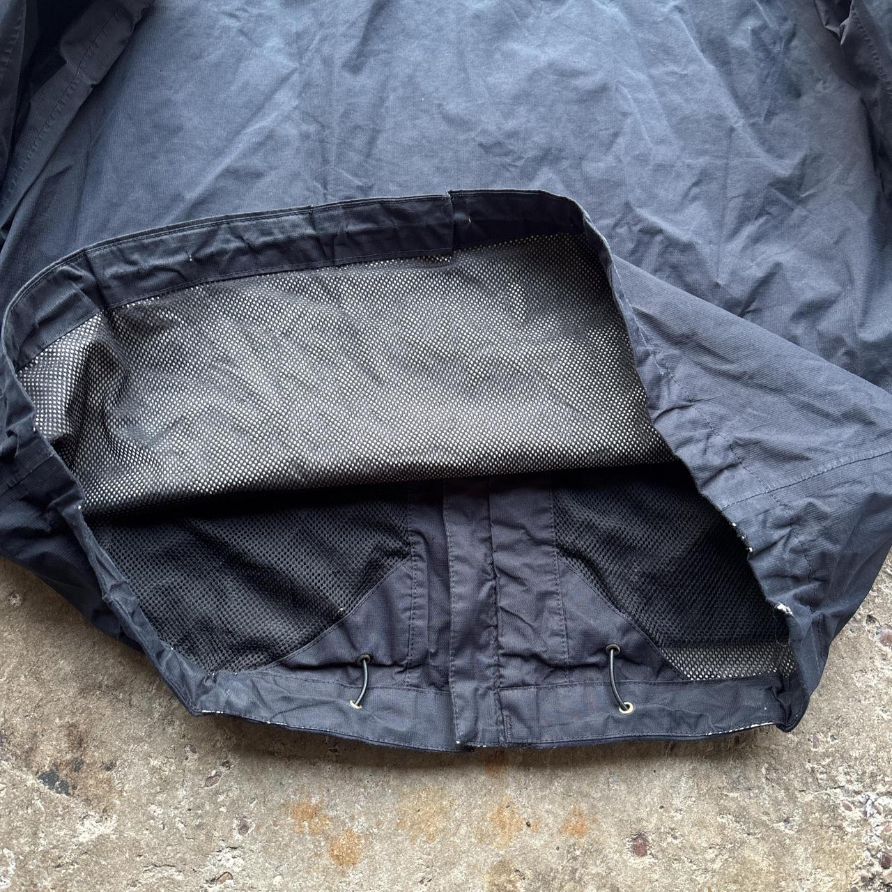 Navy The North Face rain jacket