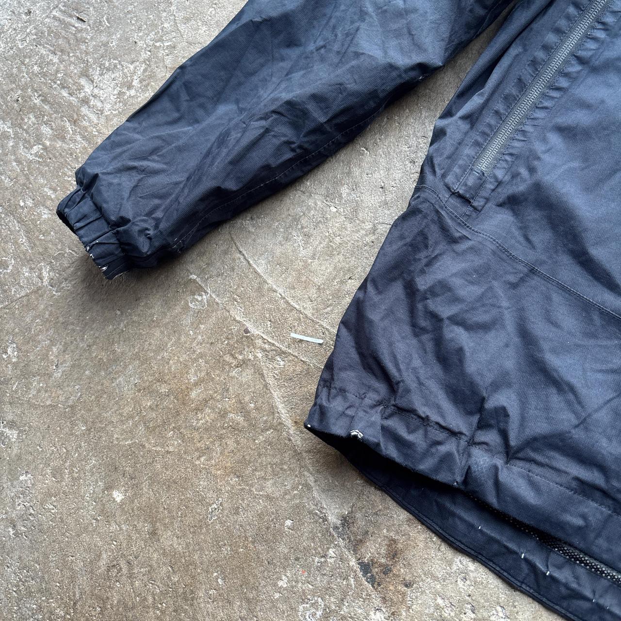 Navy The North Face rain jacket