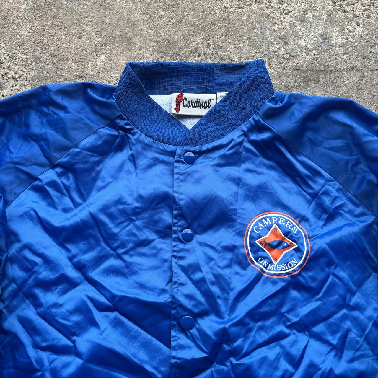 Blue Cardinal bomber jacket with ‘Campers on Mission’ logo