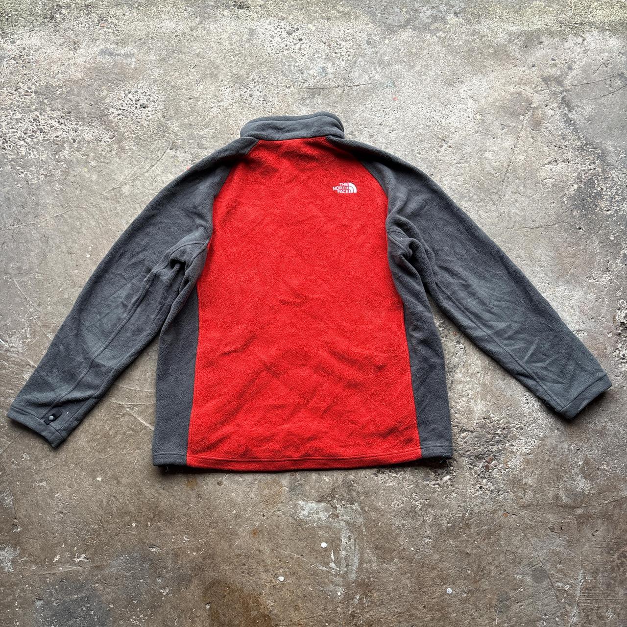 Red and grey The North Face zip-up fleece