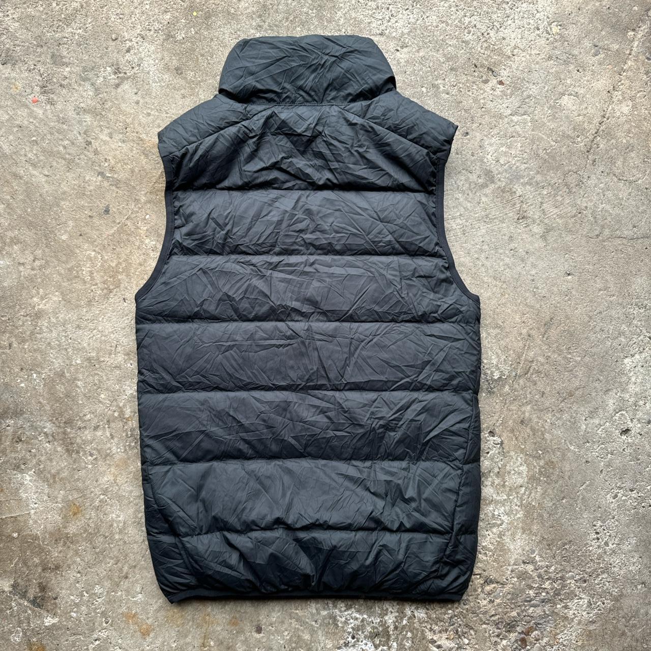 Black Nike puffer gilet with Melbourne Renegades logo