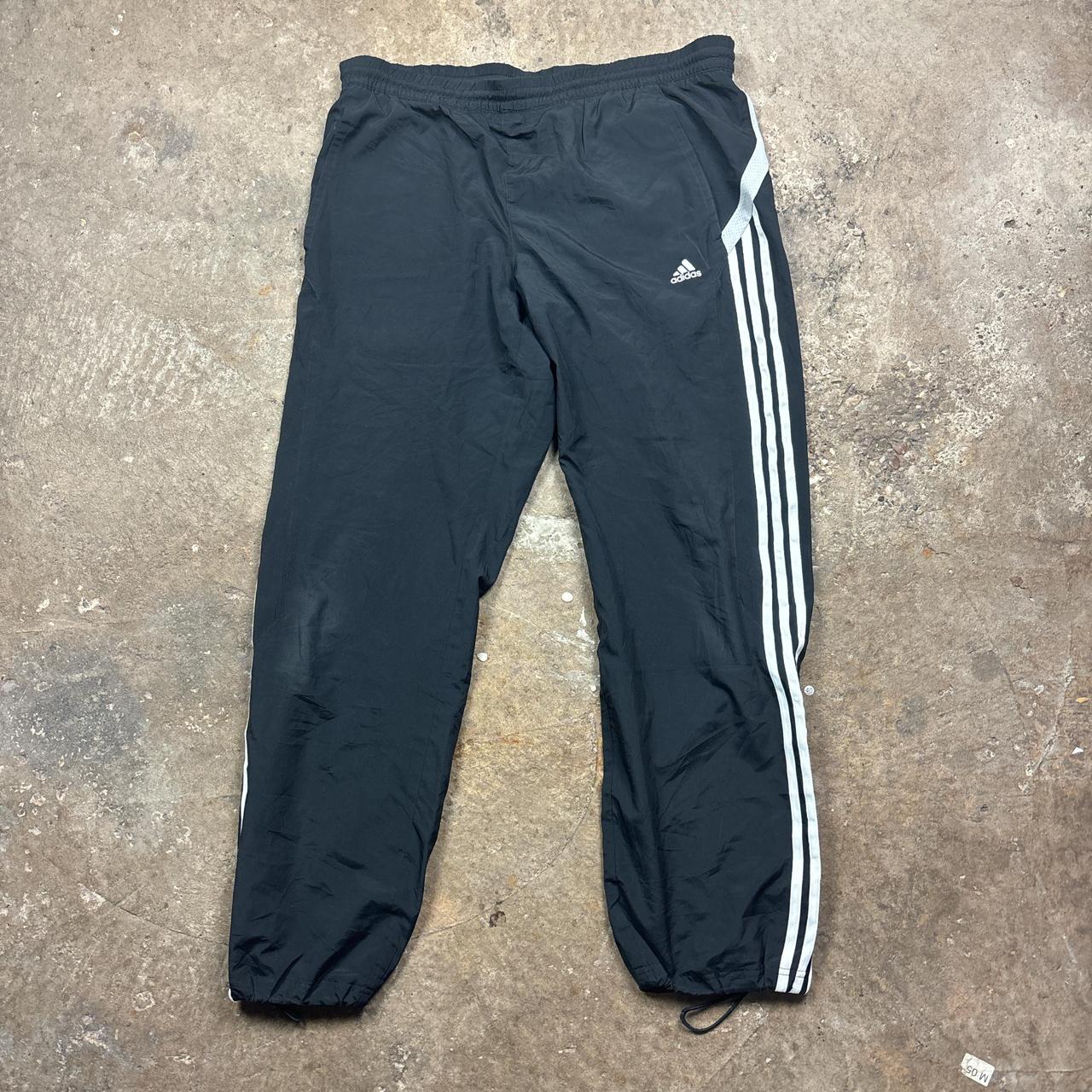 Black Adidas track pants
