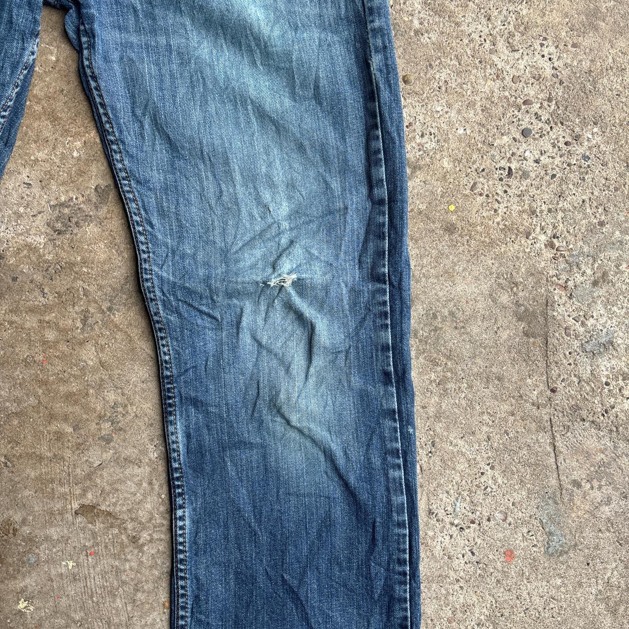 Blue Denim Distressed Levi’s Jeans