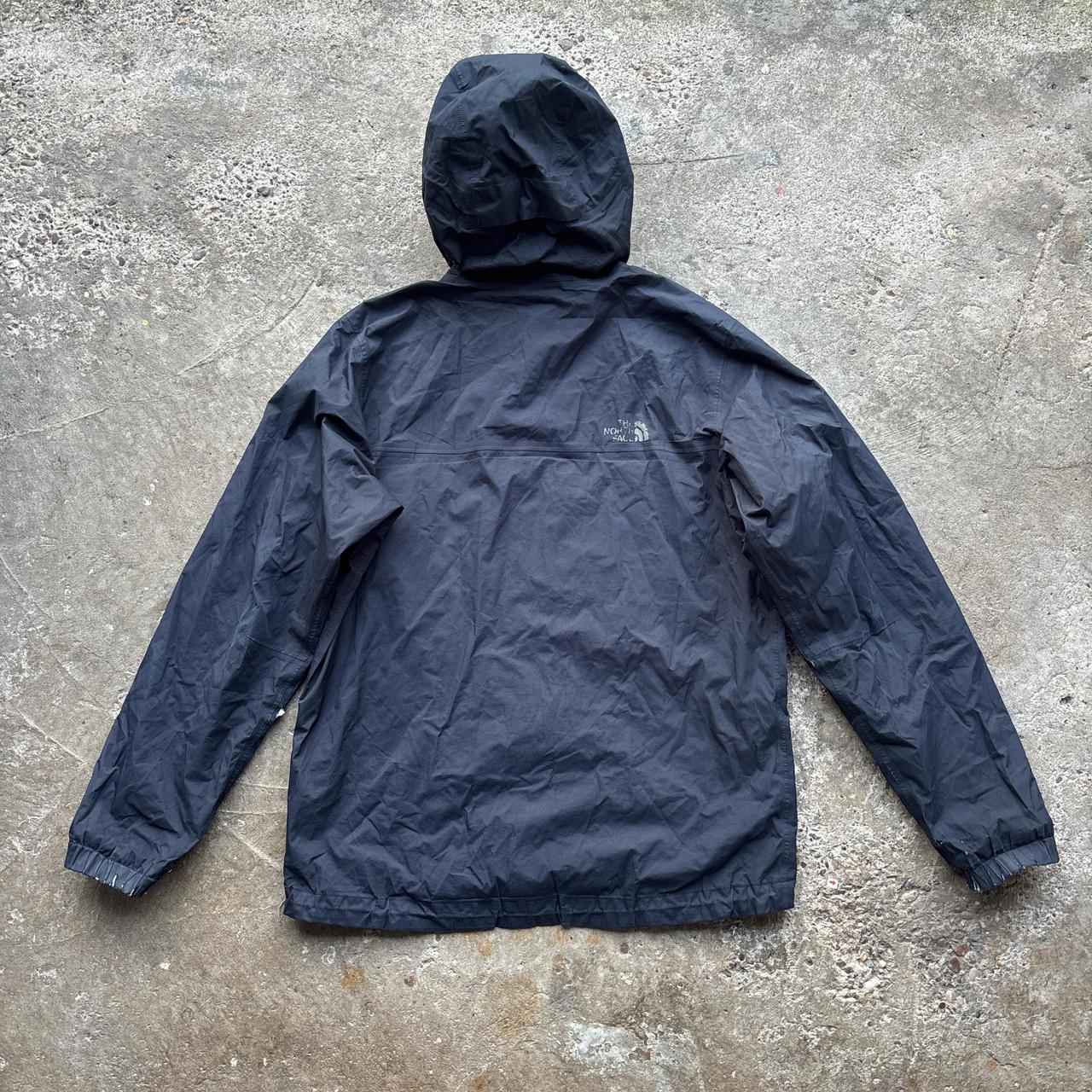 Navy The North Face rain jacket
