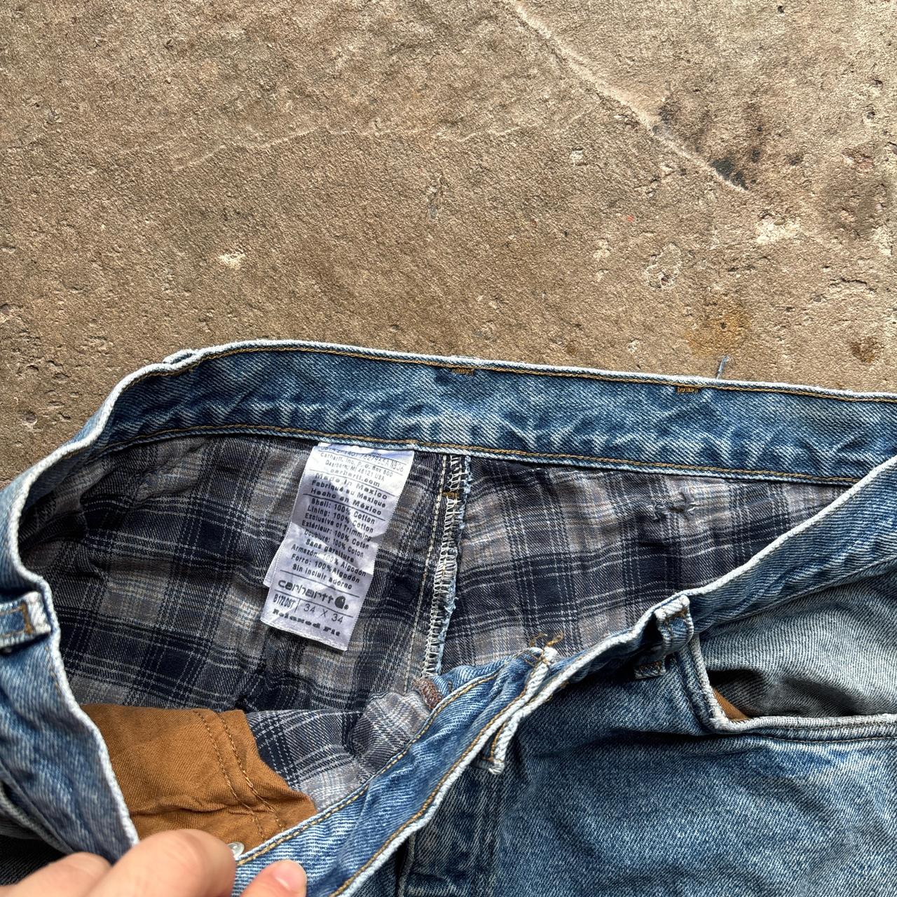 Distressed Carhartt blue denim jeans - W34
