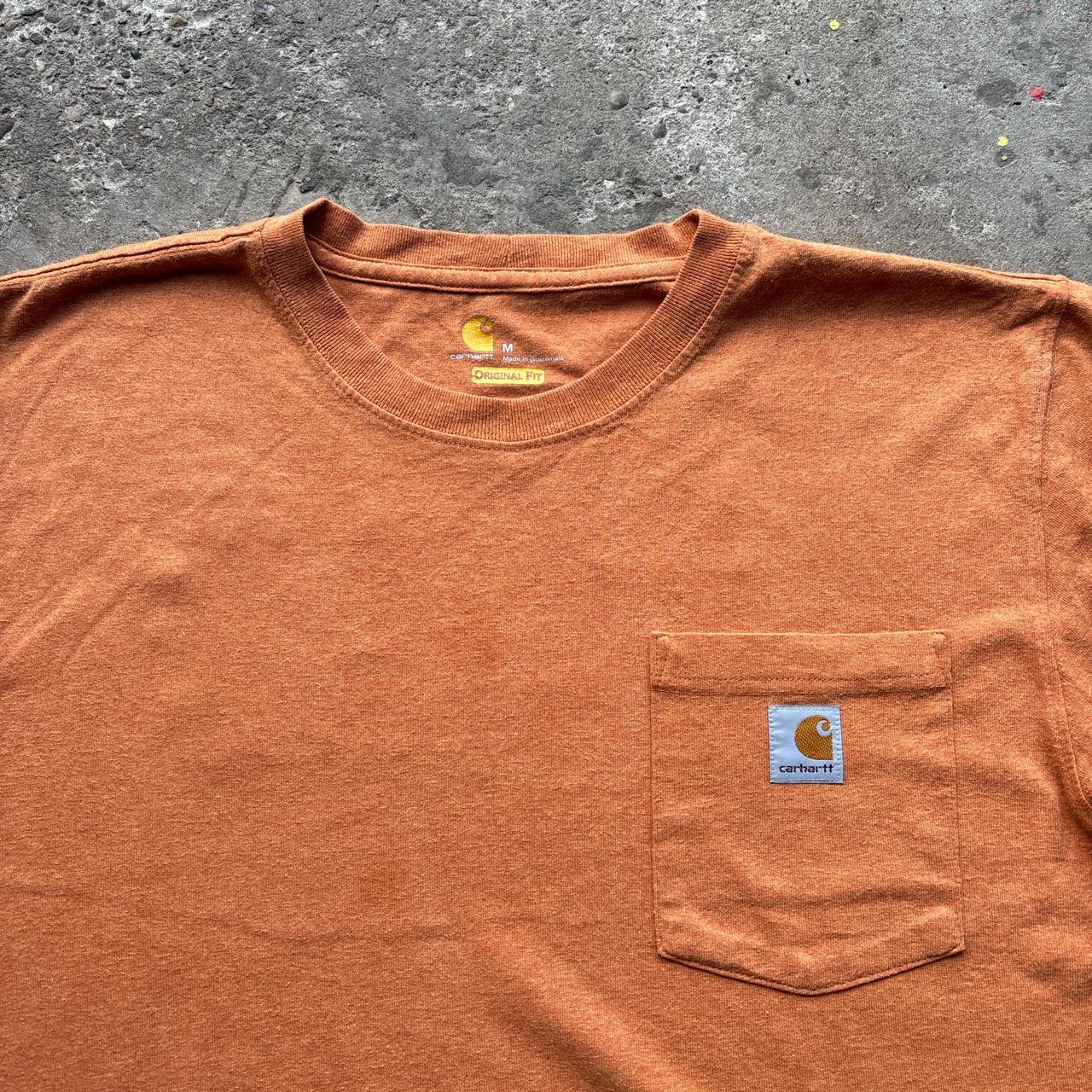 Orange Carhartt pocket tee with company logo - M