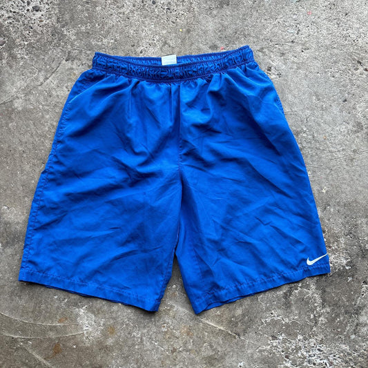 Blue Nike swim shorts / trunks