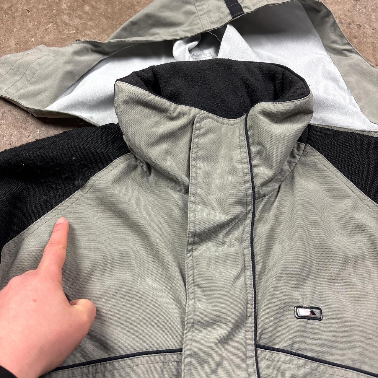 Grey and black waterproof Trespass winter jacket