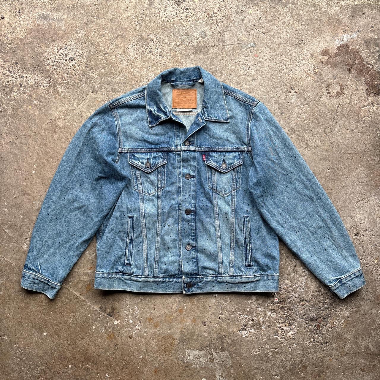 Blue Levi’s Trucker jacket with paint splats
