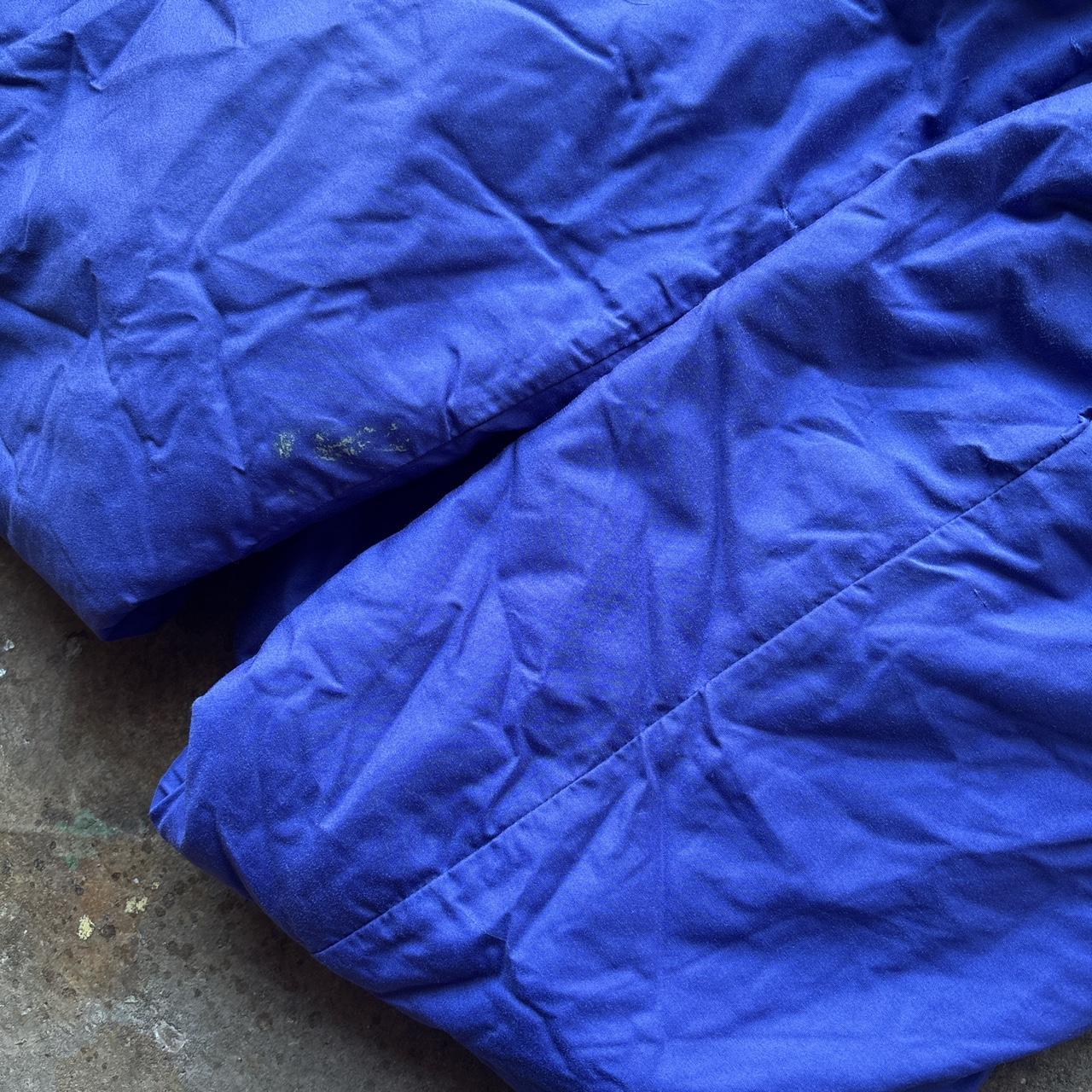 90s vintage Swiss Sport ski suit in blue and green