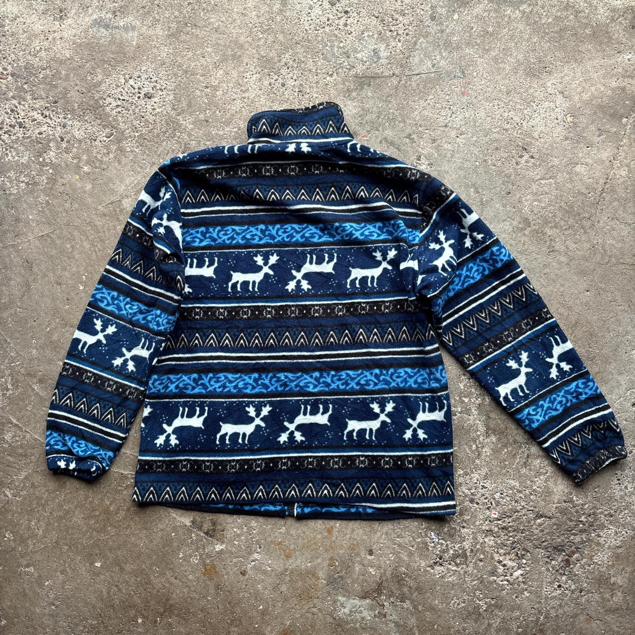 Navy crazy fleece with reindeer pattern