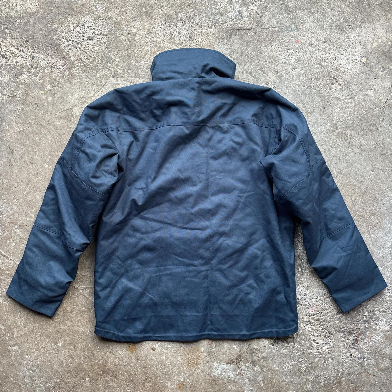 Navy Snickers workwear jacket with embroidered logos