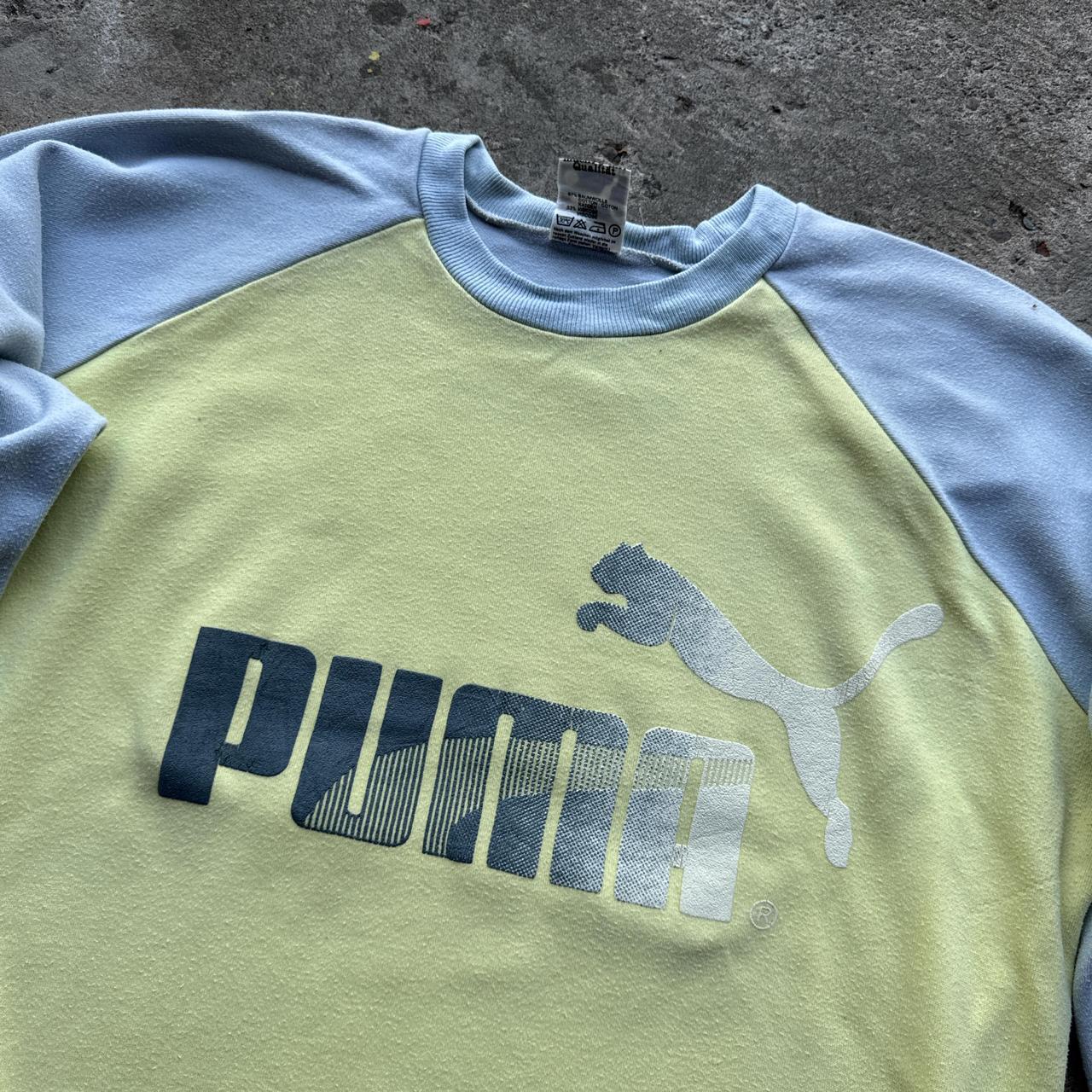 Grey and yellow Puma sweatshirt with German print at the back