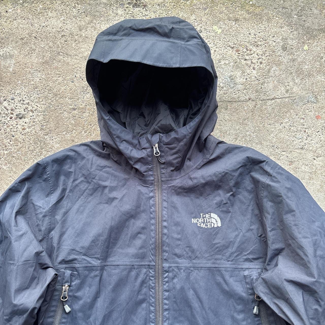 Navy The North Face rain jacket