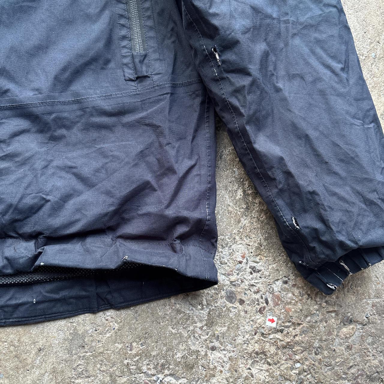 Navy The North Face rain jacket