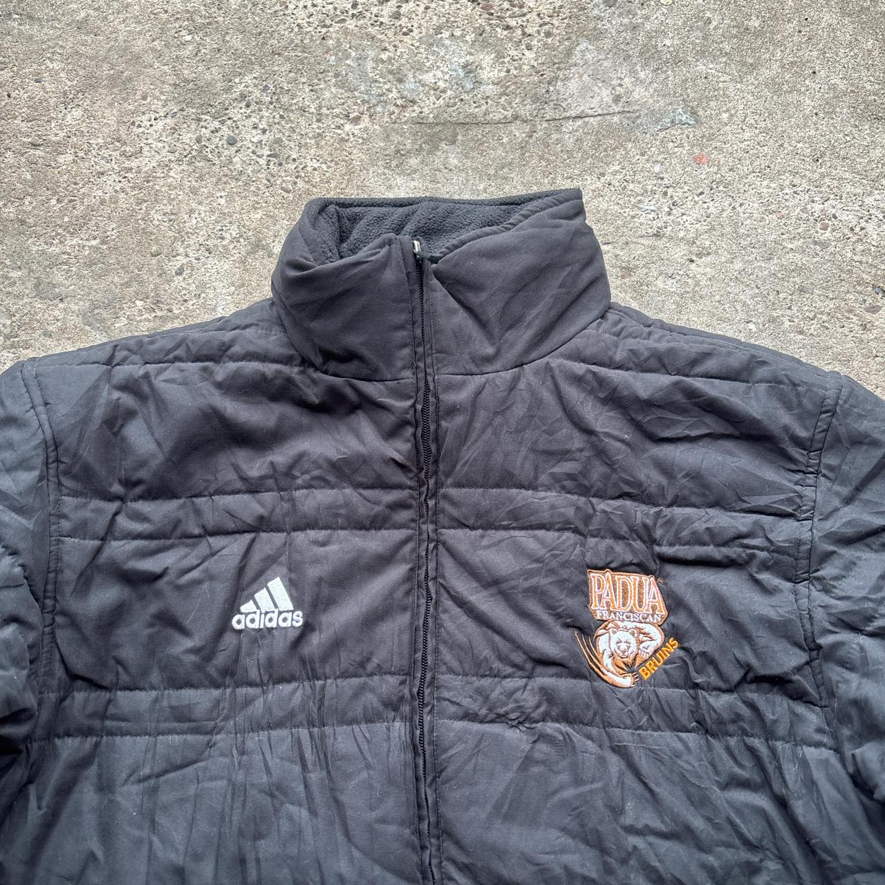 Black Adidas puffer jacket with embroidered logo