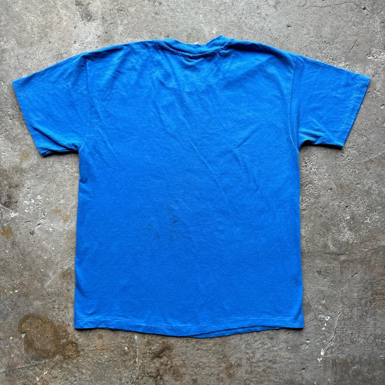 Blue graphic tee with Celtic print