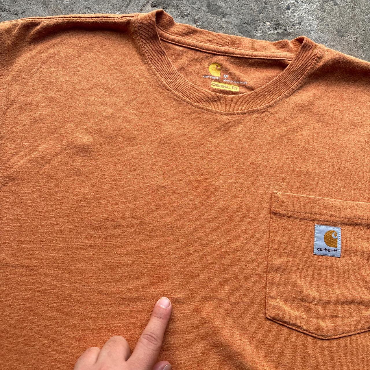 Orange Carhartt pocket tee with company logo - M