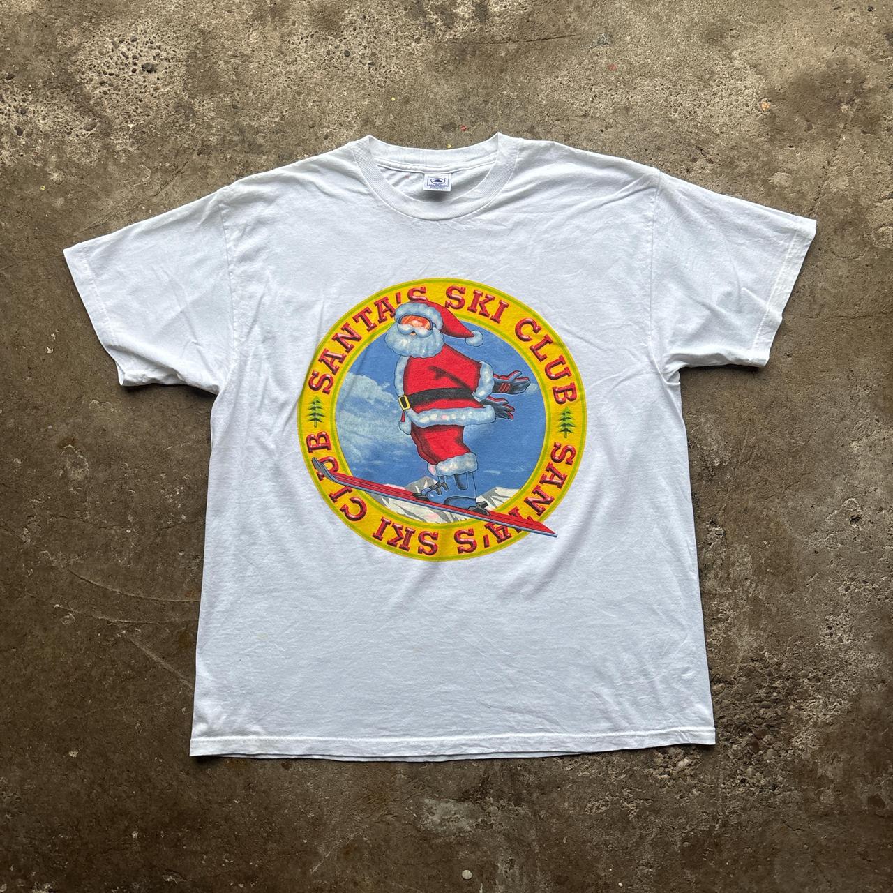 White graphic tee with ‘Santa Ski Club’ graphic