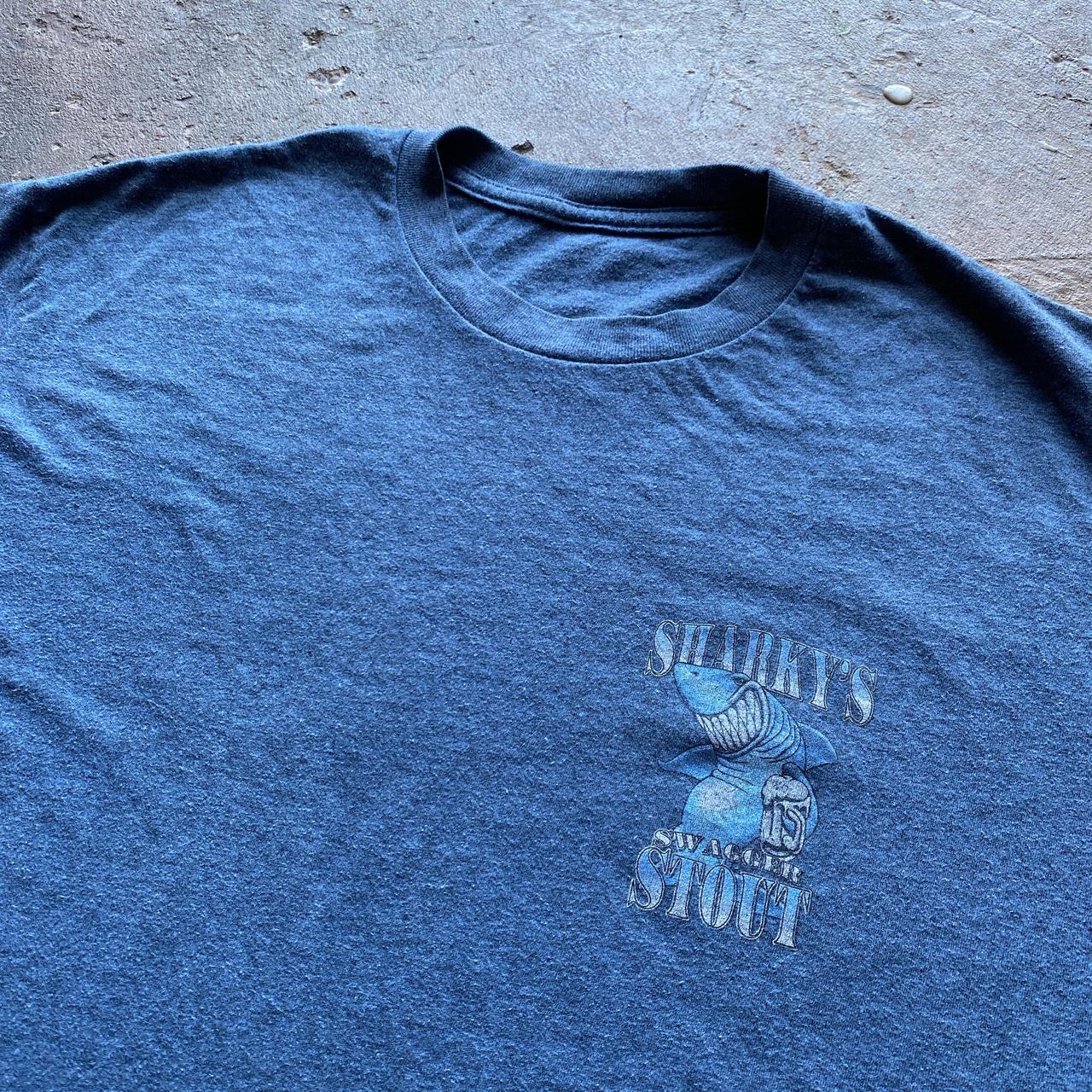 Blue “Sharky’s Swagger Stout” graphic tee